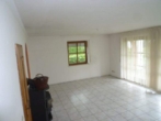 Wohnzimmer mit Kamin - Großzügige u. schöne DHH mit Terrasse, Balkon, Garten u. Garage